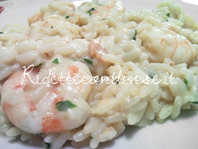 Primo piano risotto gamberoni e salmone di Teresa Mastandrea