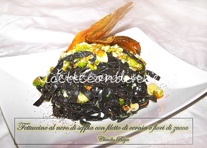 Fettuccine al nero di seppia con filetto di cernia e fiori di zucca di Claudio Rega